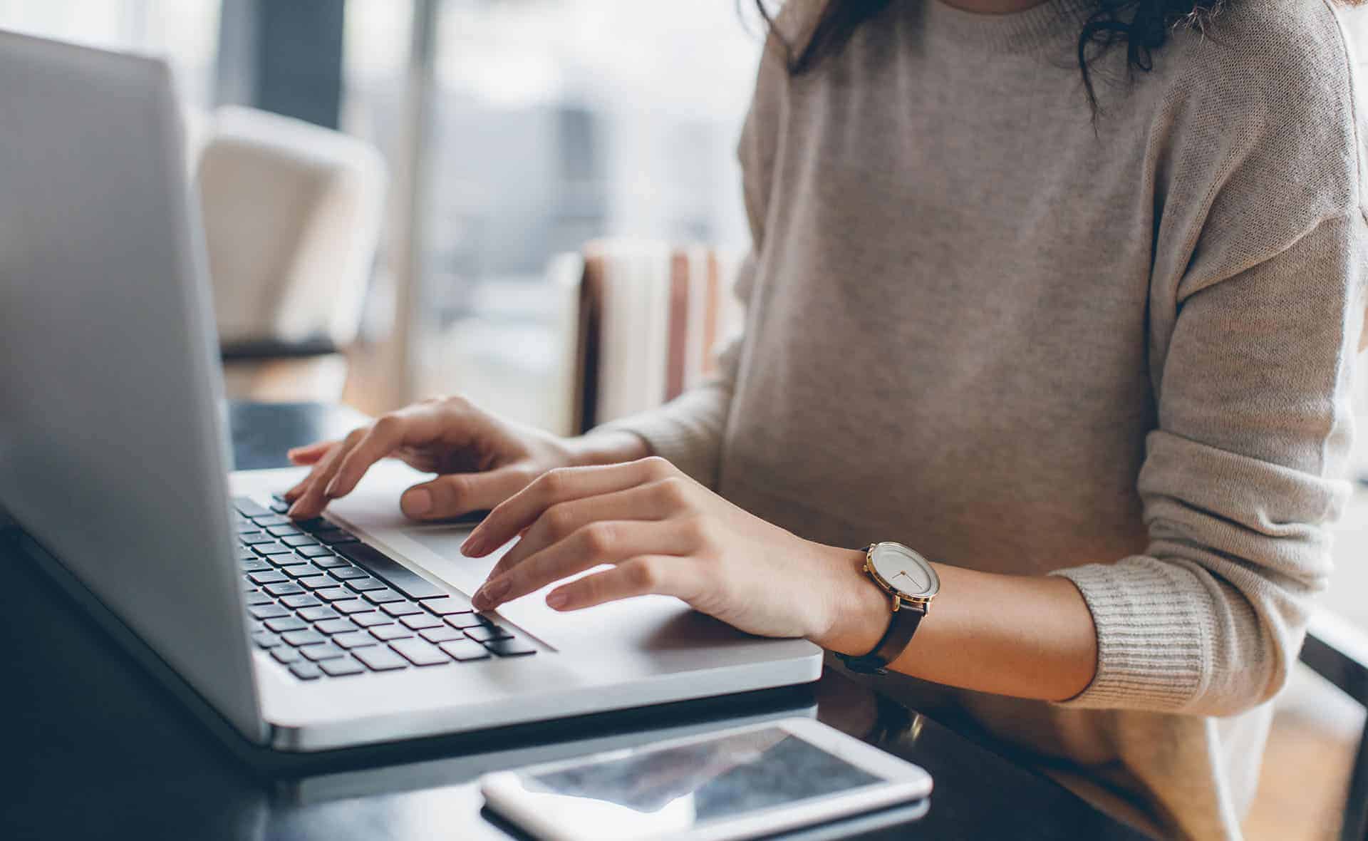 woman working on laptop internet of things